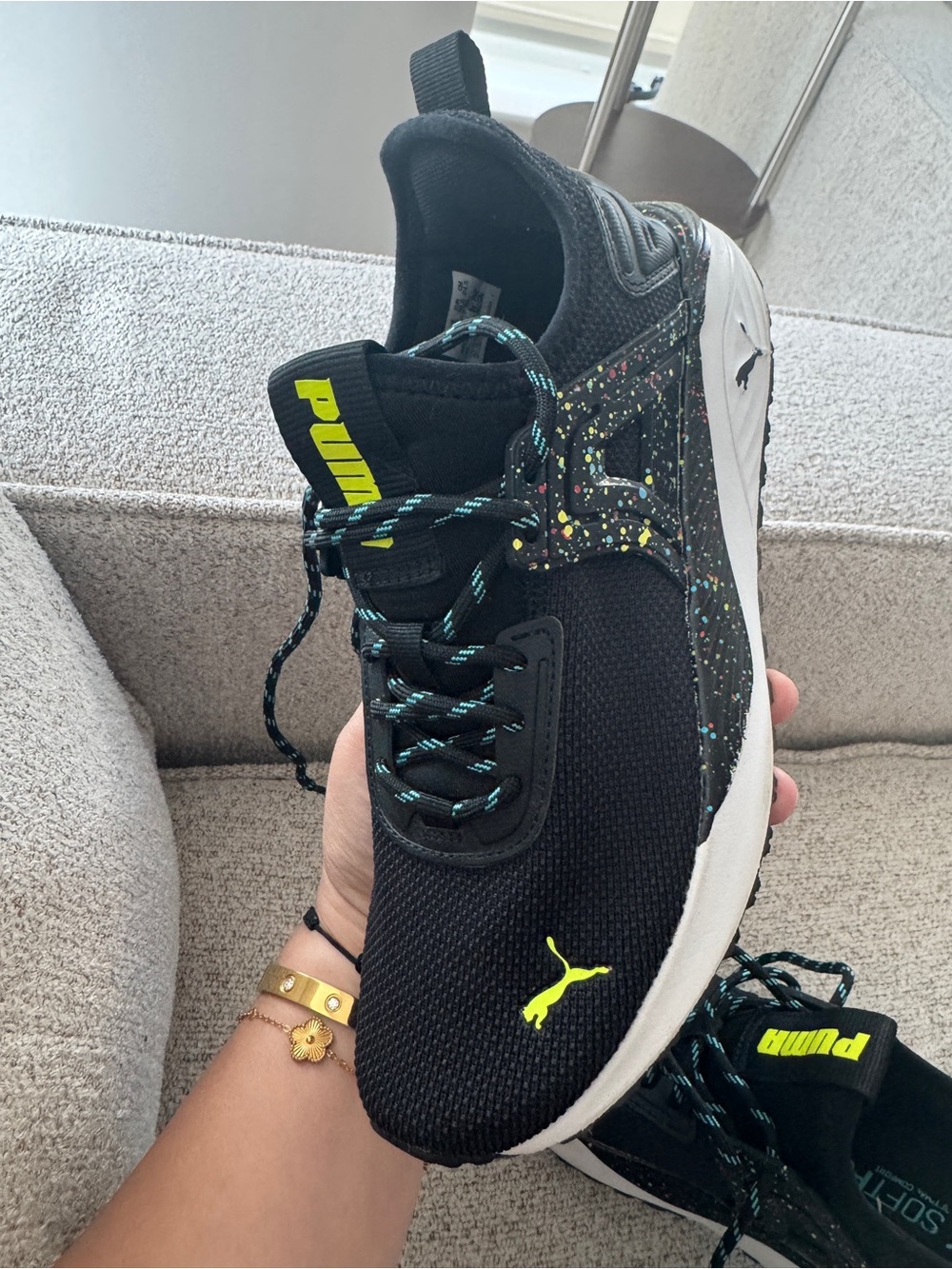 Puma Black Sneakers with Neon Yellow Logo and Speckled Detail